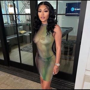 Green,yellow,tan small fitted dress. Size small. Never worn